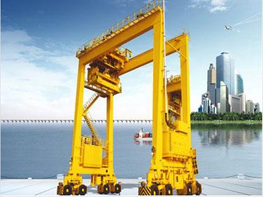 Разширено представяне от каучук на контейнерния контейнер Portal Crane.jpg Advanced Performance Rubber-Tyred Container Portal Crane.jpg